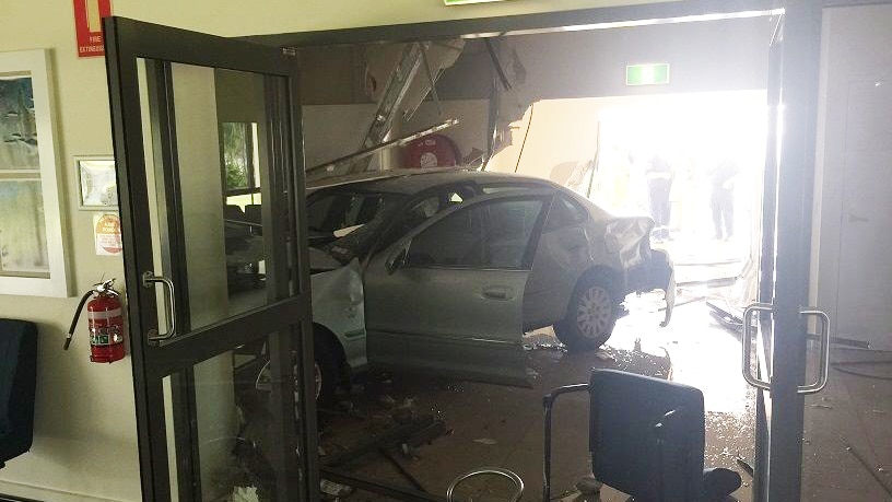 The 78-year-old driver's car, where it came to rest after crashing through the church in Darwin's north.