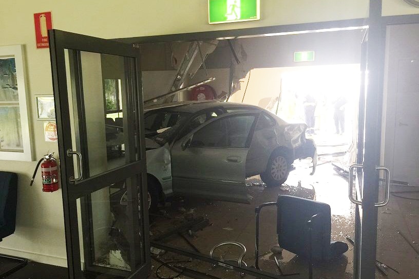 The 78-year-old driver's car, where it came to rest after crashing through the church in Darwin's north.