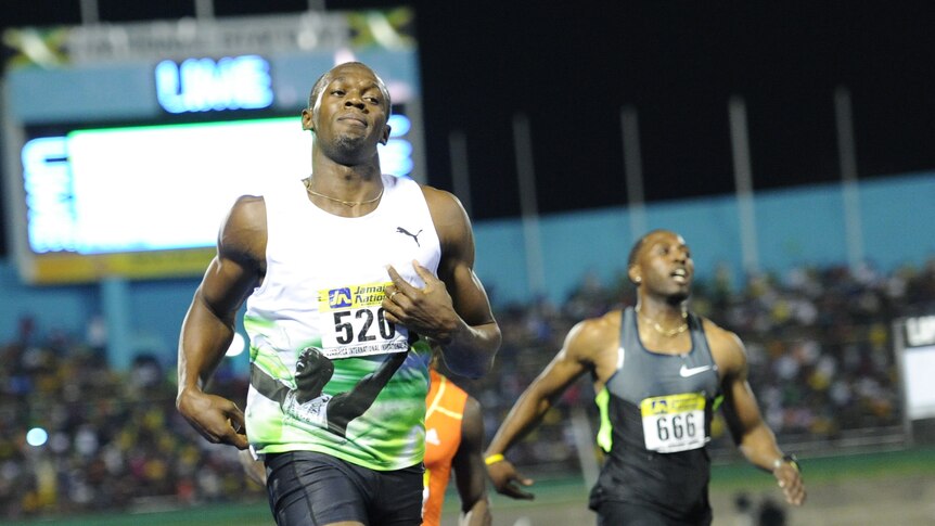 Usain Bolt has clocked the fastest time in the world this year for the 100m in Jamaica.