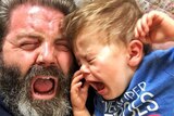 A toddler cries during a tantrum.