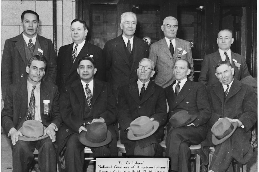 A black and white archival photo of members of the National Congress of American Indians in 1944