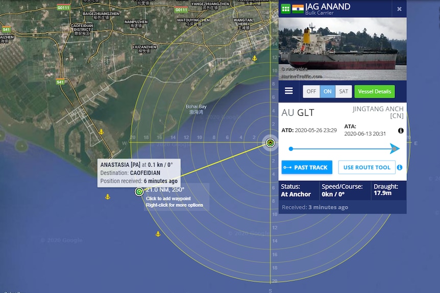 You view a satellite map of the Chinese coast with two dots showing stranded vessels, with an inset picture of one of them.