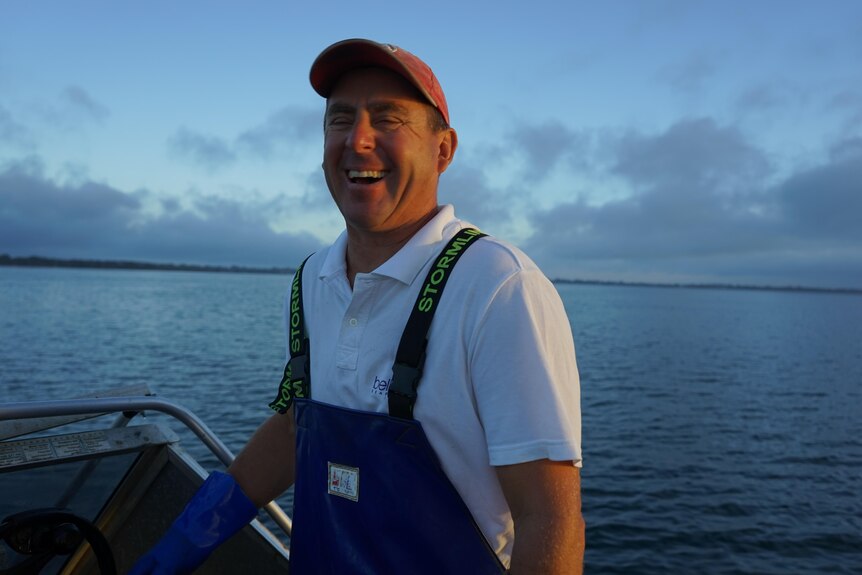 Photo of Fisherman Damien Bell on his boat