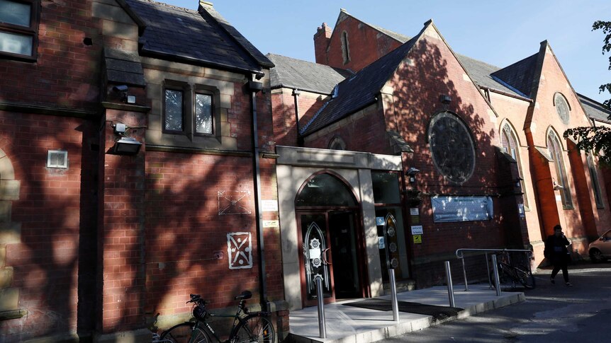 A photo of the red bricked Didsbury mosque in Manchester.