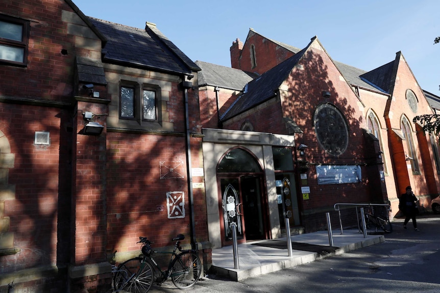 A photo of the red bricked Didsbury mosque in Manchester.