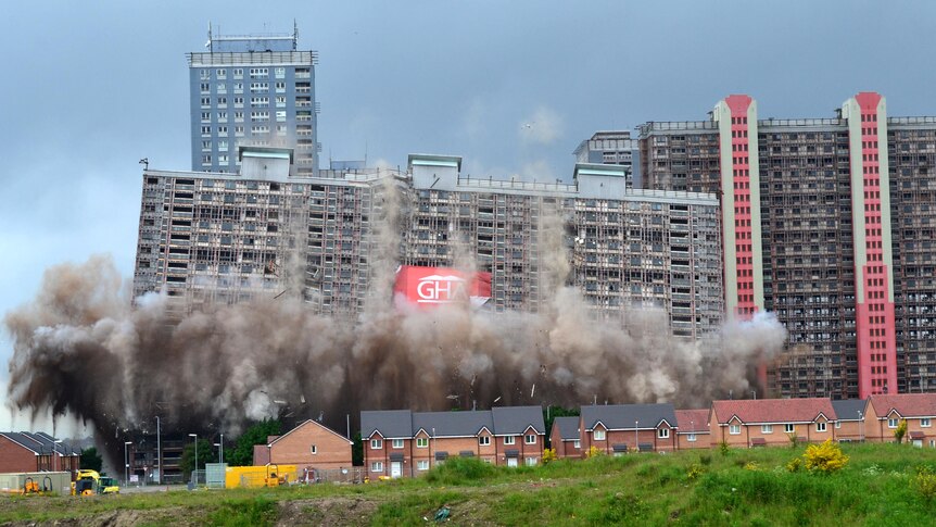 The first of the Red Road Flats come down during a controlled demolition.
