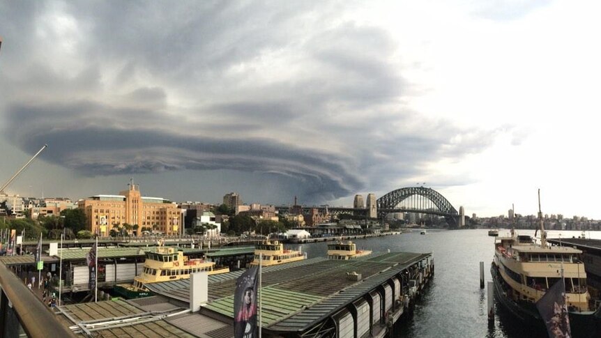 Storm clouds hover over the Sydney Harbour Bridge