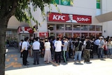 Long line outside a Japanese KFC restaurant