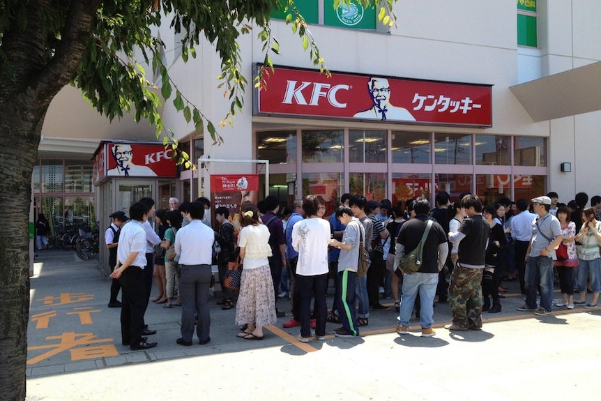 Long line outside a Japanese KFC restaurant