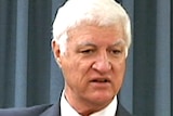 Federal independent MP Bob Katter gestures as he speaks to candidates of his party, Katter's Australian Party.