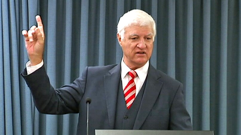 Federal independent MP Bob Katter gestures as he speaks to candidates of his party, Katter's Australian Party.