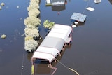 A flooded building from the air.