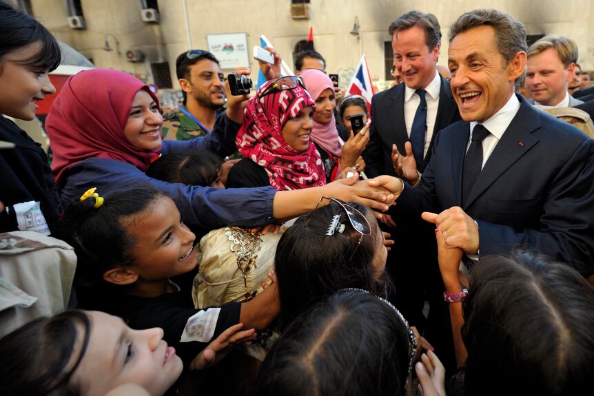 Nicolas Sarkozy and David Cameron meet the crowd in Benghazi