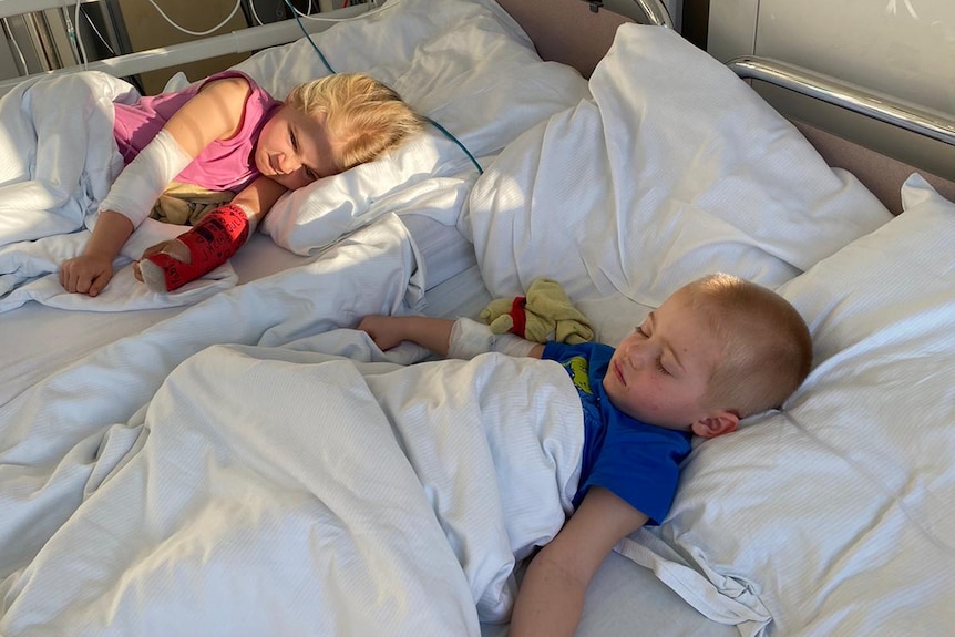 Charlotte and Freddie Rowley in hospital beds