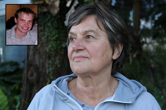 Rosslyn Williams looks away while sitting in her garden. Her young son is in an inset in the top-left corner.