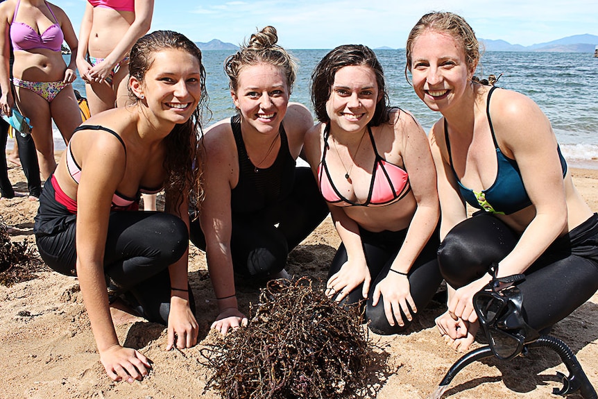 Young women in swimsuits at the beach