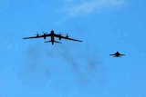 US fighter plane escorts Russian bomber