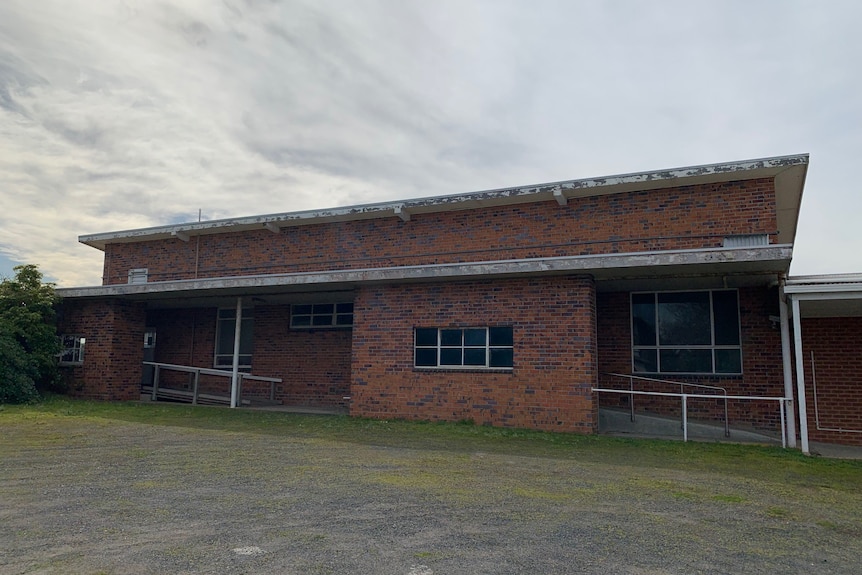 Old 1950s red brick building.