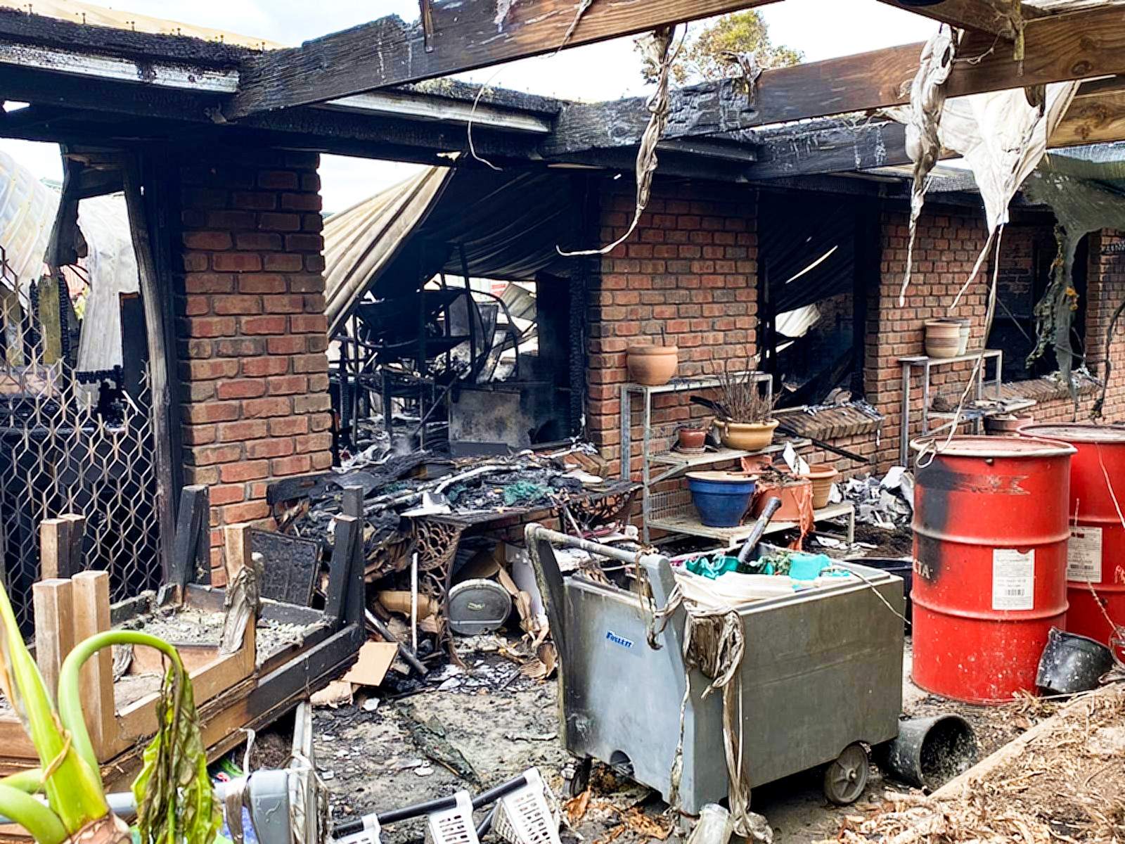 Houses and sheds lost in nowcontained Duck Ponds fire near Port