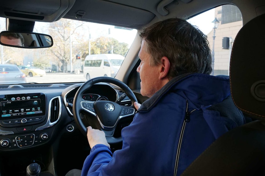 Brendan Smith behind the wheel in the Melbourne CBD