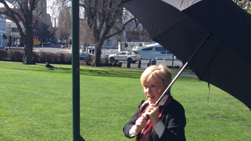 Joan Rylah, Liberal member for Braddon, with an umbrella