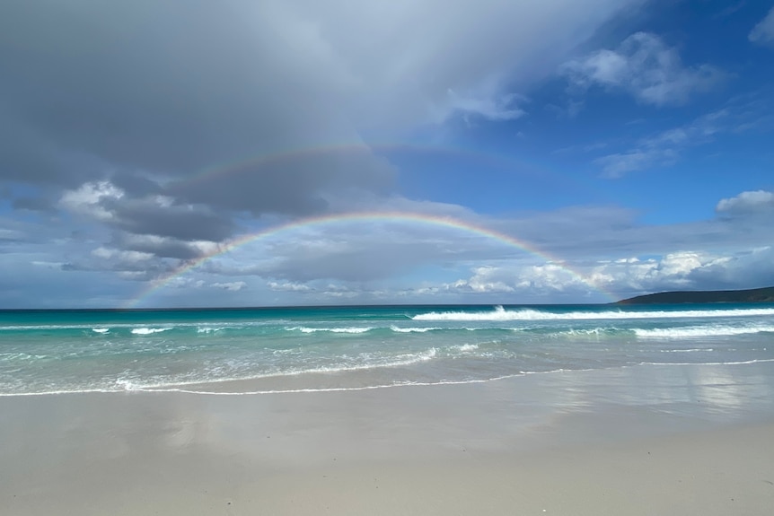 A rainbow on a beach
