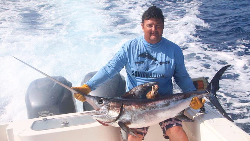 Matt Price with his winning marlin while chasing the fishing royal grand slam.