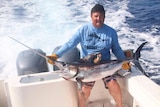 Matt Price with his winning marlin while chasing the fishing royal grand slam.