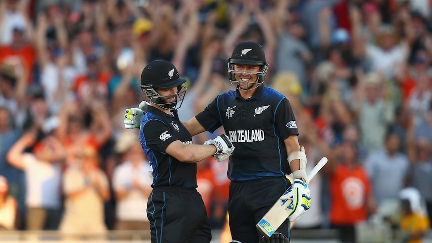 Kane Williamson and Trent Boult of New Zealand celebrate victory