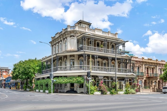 A large three-storey Italianate 19th century pub on an intersection 