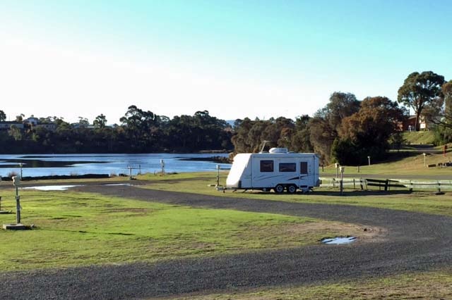 A lone caravan at the Treasure Island Caravan Park at Berriedale, Tasmania.