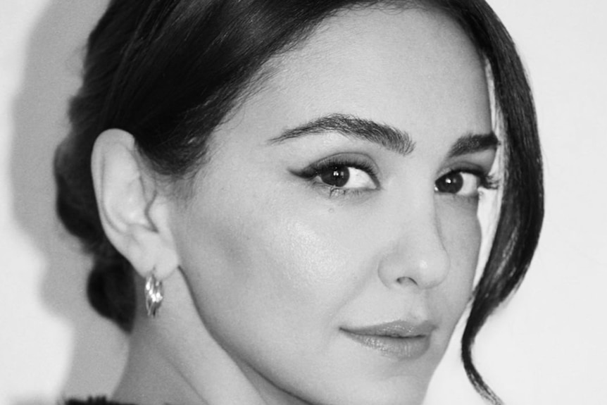 black and white face shot of an Iranian actress