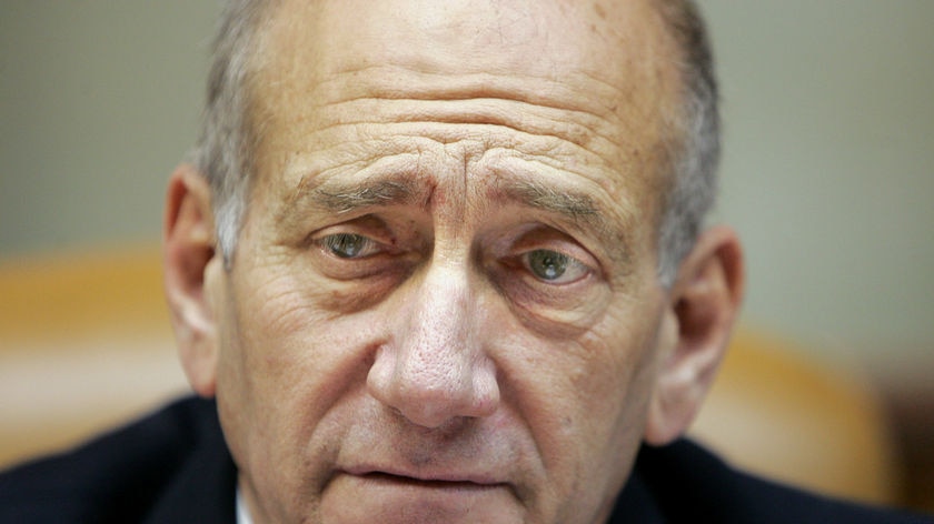 Israeli Prime Minister Ehud Olmert says the cancer is at an early stage and he will not require radiation therapy at this time (file photo)