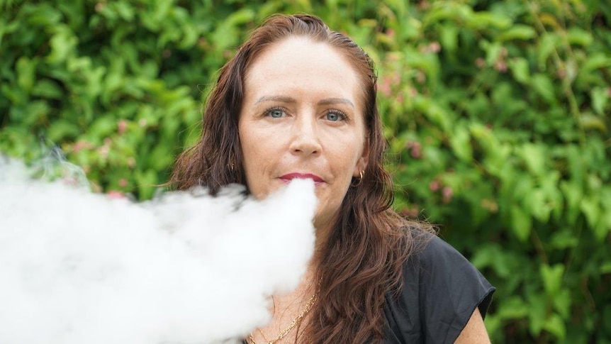 Sarah Gayford smokes an e-cigarette