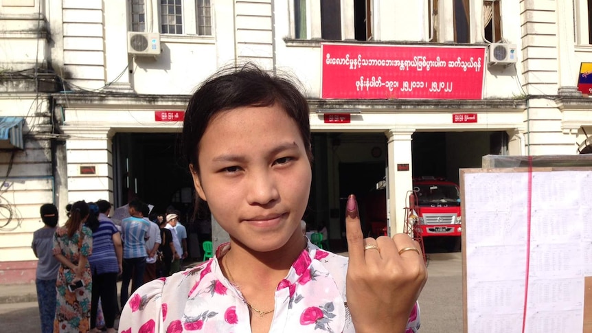 First-time voter casts her ballot in Myanmar's historic elections on November 8, 2015