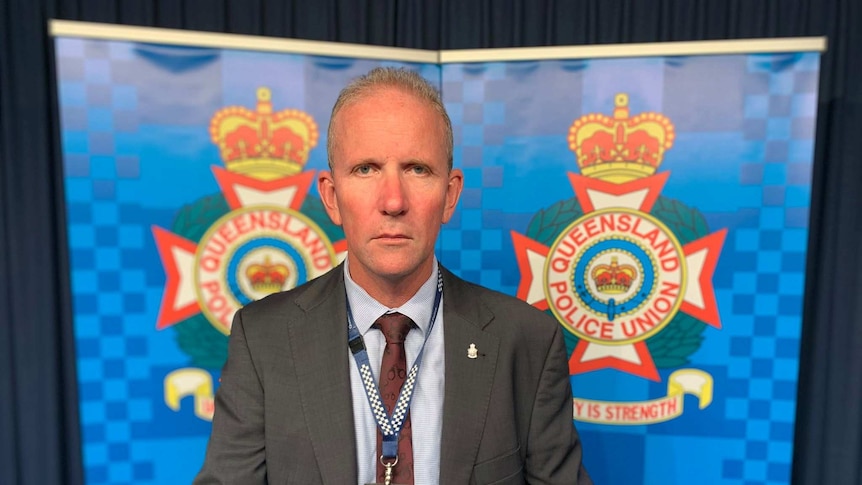 Queensland Police Union president Ian Leavers looks at the camera with a serious expression