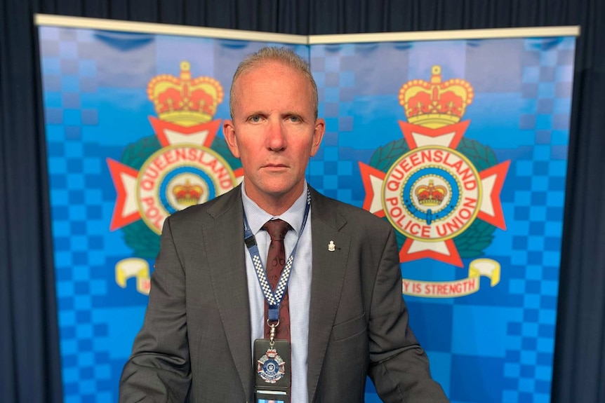 Queensland Police Union president Ian Leavers looks at the camera with a serious expression