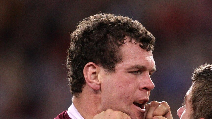Facing the axe? Jason King, here in a scuffle with Brisbane's Andrew McCullough, may miss out on Origin II.