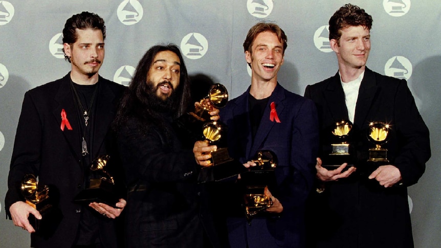 Soundgarden poses with their Grammy Award in 1995