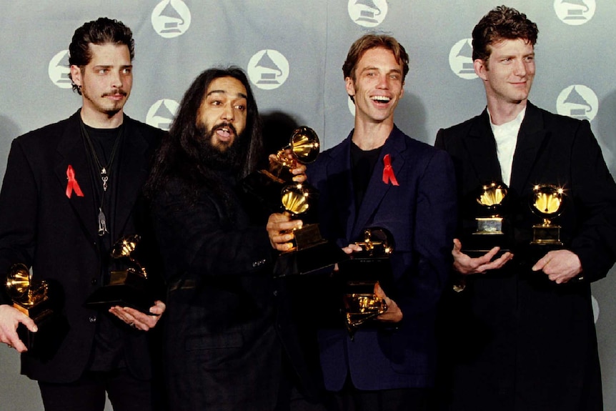 Soundgarden poses with their Grammy Award in 1995