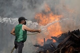 Resident hoses fire in Portugal
