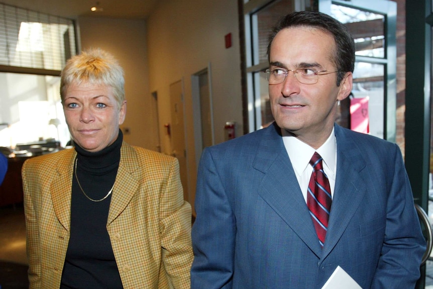 Jean Lapierre and his wife Nicole Beaulieu arrive for a news conference