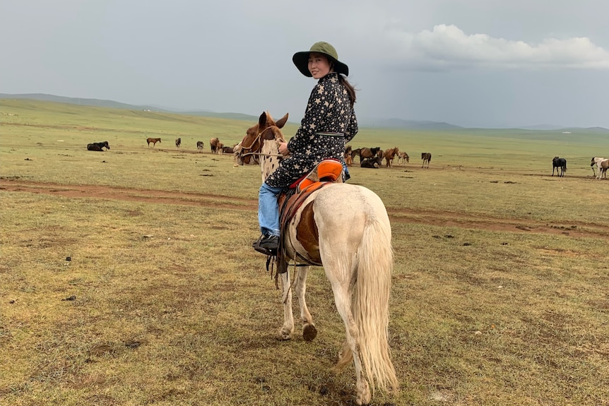 Femme sur un cheval