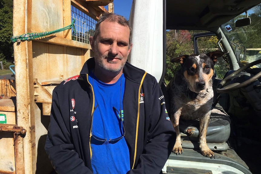 Carpenter Andrew Lamburd and his dog Archie