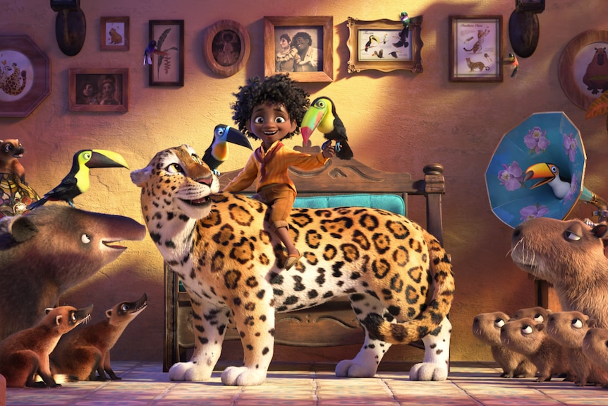 Animated young brown boy with curly afro wears orange top and pants riding a friendly tiger. A toucan perches on his arm.