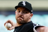 A Chicago White Sox player delivers a pitch.