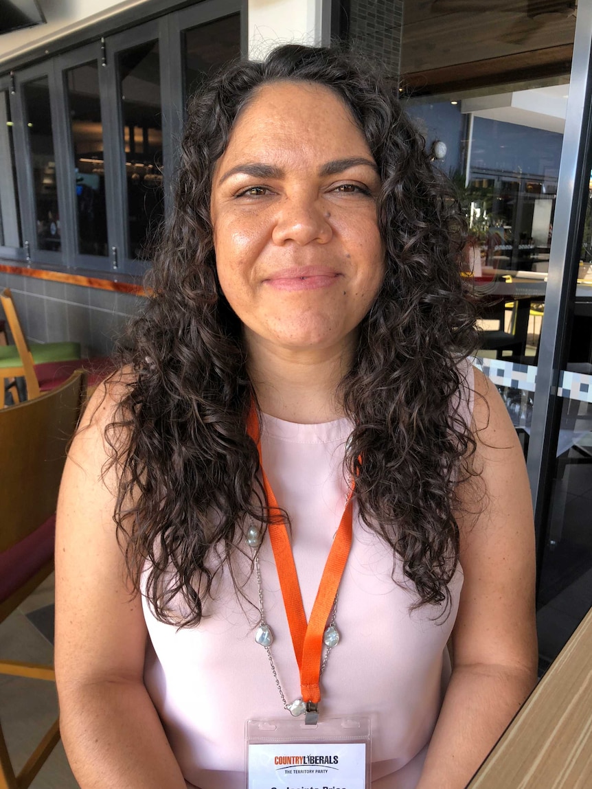 Alice Springs town councillor Jacinta Price sits and smiles.