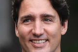 Prime Minister Justin Trudeau walks with Sophie Gregoire Trudeau.