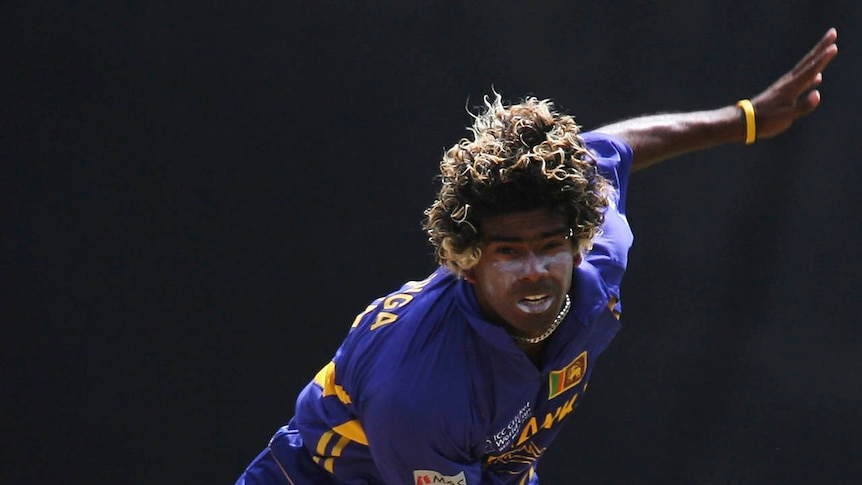 Three wickets ... Lasith Malinga sends down a delivery