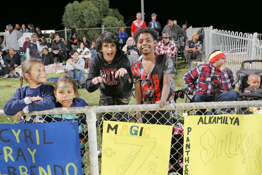 Kids with signs